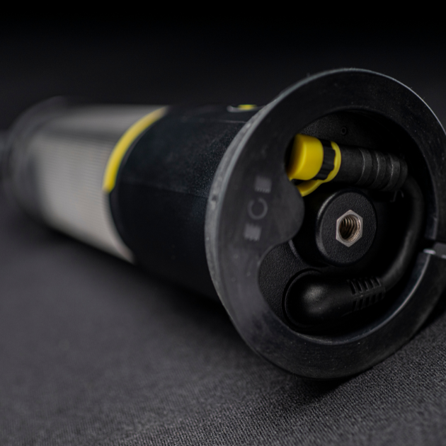 Ledlenser AL10R Work Lantern end view showing black body with yellow accents and mounting hub with connector