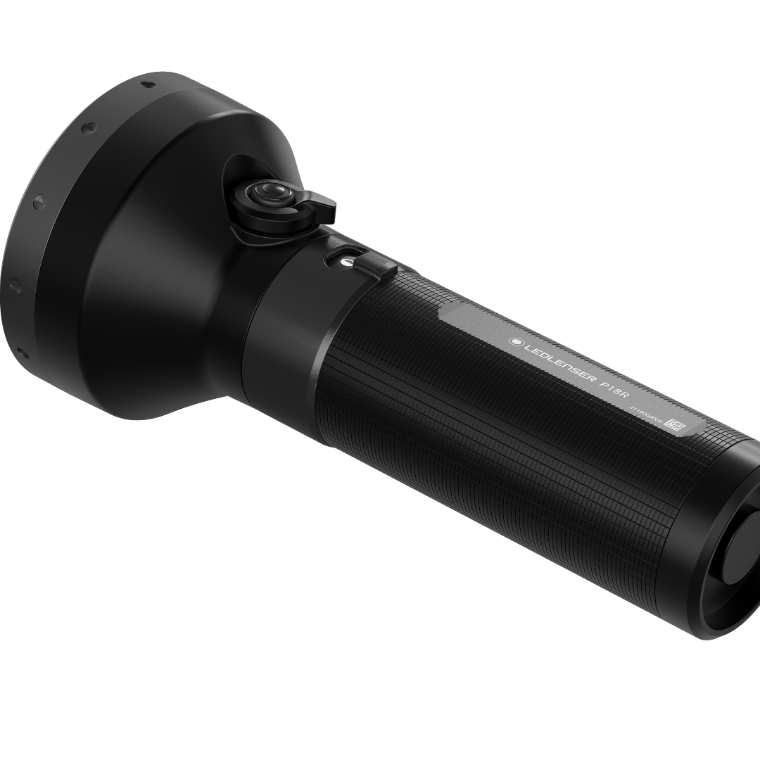 Ledlenser P18R Torch angled view showing black textured handle and large front head with side control switch