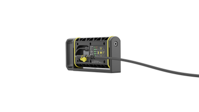Ledlenser AF4R Work Floodlight side view showing grey housing with yellow accents connected to a power cable