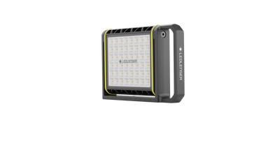AF8R Work Floodlight viewed at slight angle showing rectangular LED panel with grid grey housing with yellow trim and built in handle Ledlenser branding