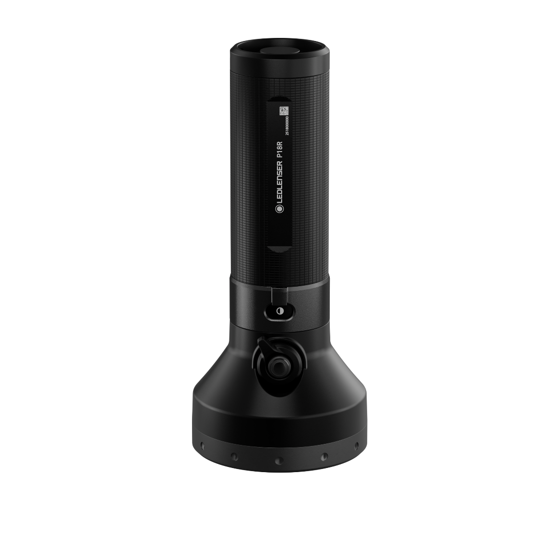 Ledlenser P18R Torch shown in vertical orientation with cylindrical black housing textured grip and base charging dock