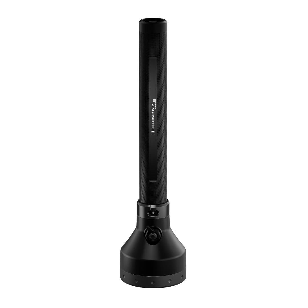 Ledlenser P21R Torch on charging stand upright black flashlight with base dock and mounting dock visible