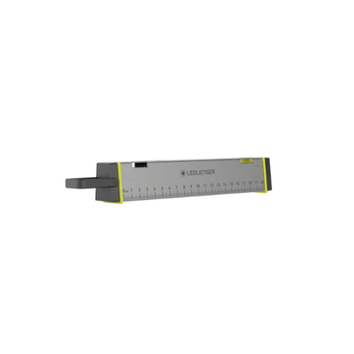 Ledlenser AF2R Work Area Light shown in side view with grey body yellow trim and built in ruler