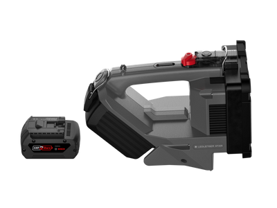 XP30R Spotlight showing a grey handheld searchlight with attached battery pack and charger for professional outdoor and industrial use