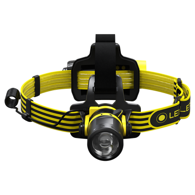 EXH8R Headlamp on a yellow and black adjustable headband with a front mounted lamp and battery housing visible on the strap