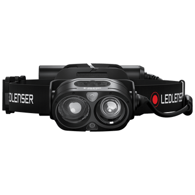 H19R Core Headlamp facing front with dual lenses and black adjustable headband with Ledlenser branding