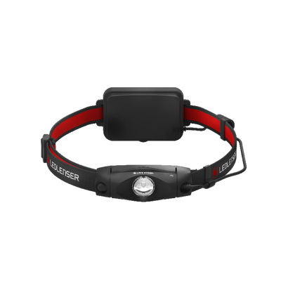 Ledlenser H4 Headlamp with black front light red adjustable head strap and battery pack mounted behind shown head on