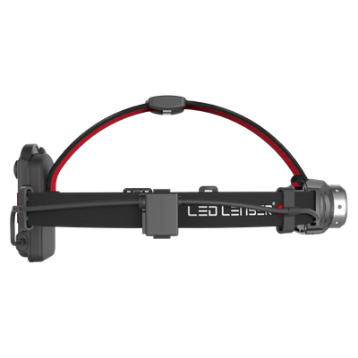 Ledlenser H6R headlamp mounted on a black adjustable headband with a red inner stripe and a battery pack on the left