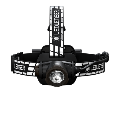 Ledlenser H7R Signature Headlamp with black adjustable headband and logo pattern front view showing the LED housing