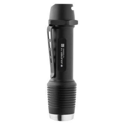 Ledlenser F1R torch standing upright with detachable head black finish side clip ribbed grip and metal tail cap