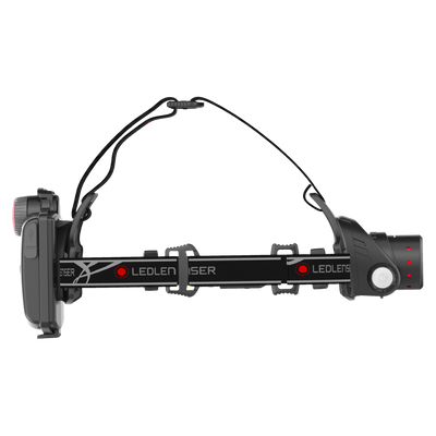 H14R 2 Headlamp with adjustable elastic headband and external battery pack on left black finish with red indicator lights on the battery unit