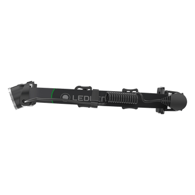 Ledlenser MH10 headlamp in black with green accent shown mounted on a headband with adjustable strap and front beam housing