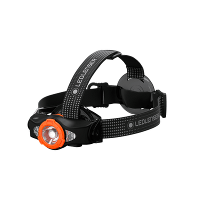 MH11 Outdoor Headlamp by Ledlenser showing black headband with orange front light in a side profile view