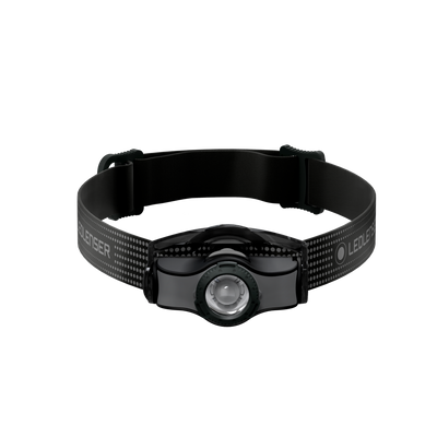 MH3 Headlamp by Ledlenser with black adjustable head strap and compact front light shown from the front