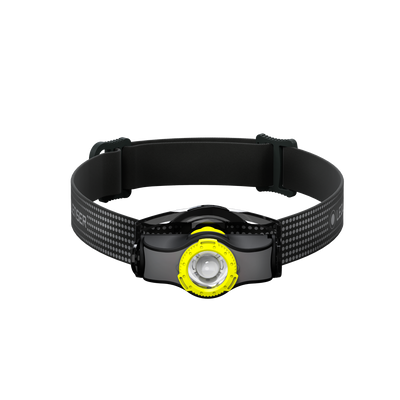 Ledlenser MH3 Headlamp with black adjustable headband and yellow ring front view of a compact rechargeable unit