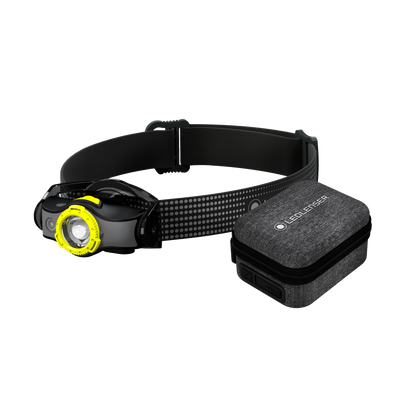 Ledlenser MH5 Powercase Combo headlamp with yellow bezel and black adjustable strap shown with charging case