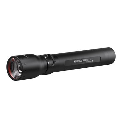 Ledlenser P17R Rechargeable Torch shown in side view with black body and red accented lens handheld professional flashlight in use