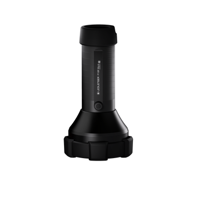 Ledlenser P18R Work Torch standing upright with textured black body and wide circular base showing the side control and full length grip