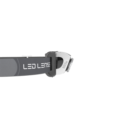 Ledlenser SEO5 Headlamp in silver with dark grey strap shown in side view highlighting the unit’s compact headlamp design