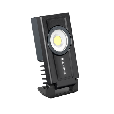 Ledlenser iF3R Spotlight compact rechargeable spotlight on a foldable stand with black housing and circular LED module