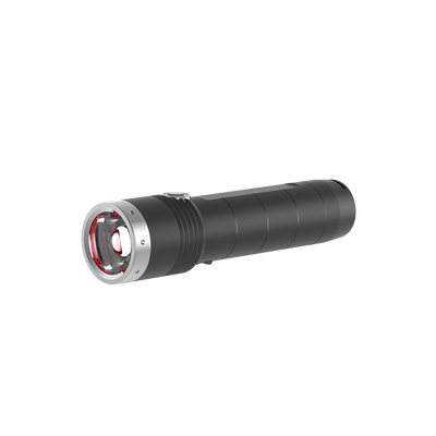 Ledlenser MT10 Torch lying horizontally with a black cylindrical body and silver bezel around the front lens