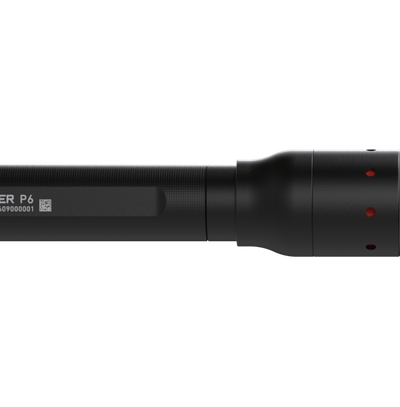 Ledlenser P6 torch side view showing black cylindrical body and end cap with red indicator holes